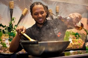 Chef Hasan DeFour cooks up Silver Snapper in Kweyol Sauce